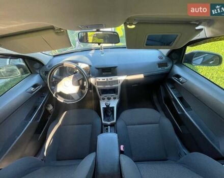 Черный Опель Астра, объемом двигателя 1.4 л и пробегом 213 тыс. км за 4999 $, фото 12 на Automoto.ua