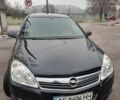 Черный Опель Астра, объемом двигателя 1.6 л и пробегом 148 тыс. км за 5750 $, фото 1 на Automoto.ua