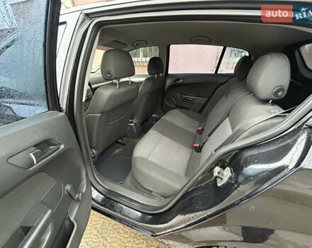 Черный Опель Астра, объемом двигателя 1.4 л и пробегом 220 тыс. км за 4350 $, фото 13 на Automoto.ua