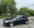 Черный Опель Астра, объемом двигателя 1.6 л и пробегом 280 тыс. км за 3900 $, фото 1 на Automoto.ua