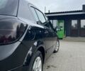 Черный Опель Астра, объемом двигателя 1.7 л и пробегом 240 тыс. км за 4799 $, фото 4 на Automoto.ua