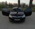 Черный Опель Астра, объемом двигателя 1.3 л и пробегом 195 тыс. км за 5800 $, фото 6 на Automoto.ua