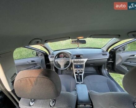 Черный Опель Астра, объемом двигателя 1.4 л и пробегом 213 тыс. км за 4999 $, фото 9 на Automoto.ua