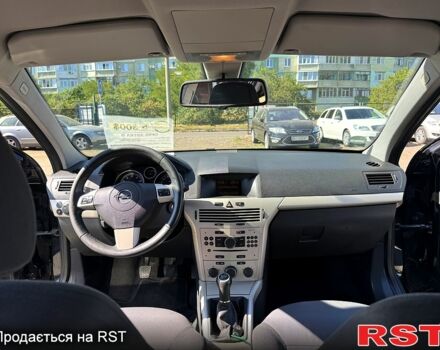 Черный Опель Астра, объемом двигателя 1.4 л и пробегом 230 тыс. км за 5300 $, фото 7 на Automoto.ua