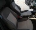 Черный Опель Астра, объемом двигателя 1.3 л и пробегом 195 тыс. км за 5800 $, фото 12 на Automoto.ua