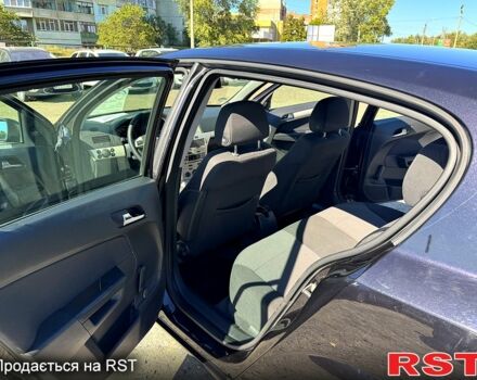 Черный Опель Астра, объемом двигателя 1.4 л и пробегом 230 тыс. км за 5300 $, фото 6 на Automoto.ua