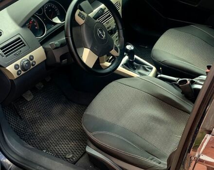 Черный Опель Астра, объемом двигателя 1.4 л и пробегом 187 тыс. км за 5999 $, фото 4 на Automoto.ua