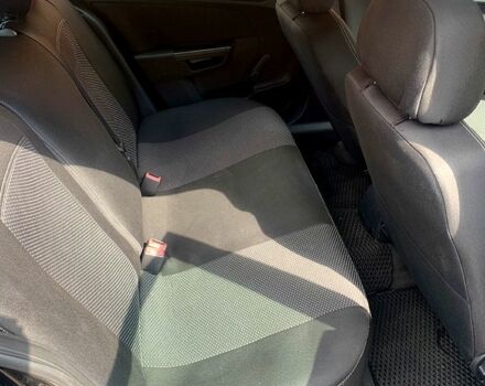 Черный Опель Астра, объемом двигателя 1.4 л и пробегом 187 тыс. км за 5999 $, фото 6 на Automoto.ua