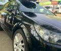 Черный Опель Астра, объемом двигателя 1.9 л и пробегом 310 тыс. км за 5000 $, фото 1 на Automoto.ua