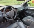 Черный Опель Астра, объемом двигателя 1.4 л и пробегом 208 тыс. км за 5050 $, фото 48 на Automoto.ua