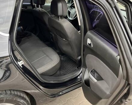 Черный Опель Астра, объемом двигателя 1.69 л и пробегом 216 тыс. км за 7800 $, фото 11 на Automoto.ua
