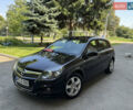 Черный Опель Астра, объемом двигателя 1.6 л и пробегом 225 тыс. км за 6000 $, фото 1 на Automoto.ua