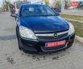 Черный Опель Астра, объемом двигателя 1.6 л и пробегом 194 тыс. км за 5000 $, фото 14 на Automoto.ua