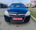Черный Опель Астра, объемом двигателя 1.6 л и пробегом 194 тыс. км за 5000 $, фото 1 на Automoto.ua