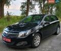 Черный Опель Астра, объемом двигателя 1.4 л и пробегом 208 тыс. км за 5050 $, фото 4 на Automoto.ua
