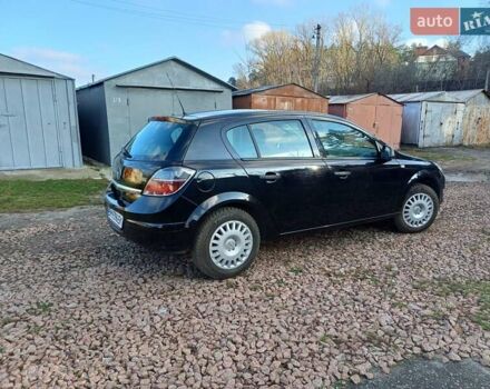 Черный Опель Астра, объемом двигателя 1.4 л и пробегом 212 тыс. км за 5900 $, фото 12 на Automoto.ua