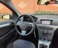 Черный Опель Астра, объемом двигателя 1.7 л и пробегом 288 тыс. км за 5600 $, фото 22 на Automoto.ua