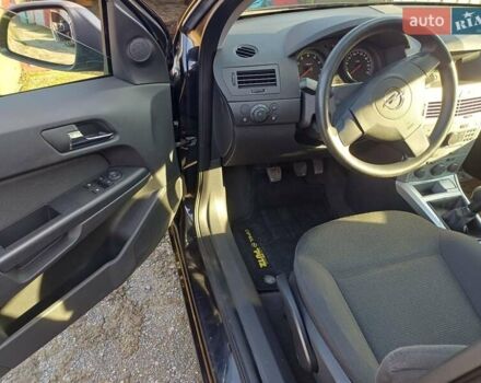 Черный Опель Астра, объемом двигателя 1.4 л и пробегом 212 тыс. км за 5900 $, фото 14 на Automoto.ua