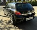 Черный Опель Астра, объемом двигателя 1.6 л и пробегом 250 тыс. км за 5900 $, фото 3 на Automoto.ua