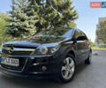 Черный Опель Астра, объемом двигателя 1.6 л и пробегом 225 тыс. км за 6000 $, фото 1 на Automoto.ua