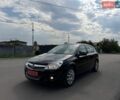 Чорний Опель Астра, об'ємом двигуна 1.4 л та пробігом 184 тис. км за 5950 $, фото 1 на Automoto.ua