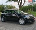Черный Опель Астра, объемом двигателя 1.4 л и пробегом 208 тыс. км за 5050 $, фото 5 на Automoto.ua