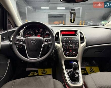 Черный Опель Астра, объемом двигателя 1.6 л и пробегом 180 тыс. км за 7700 $, фото 11 на Automoto.ua