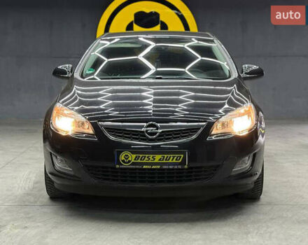 Черный Опель Астра, объемом двигателя 1.6 л и пробегом 180 тыс. км за 7700 $, фото 1 на Automoto.ua