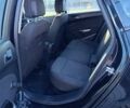 Черный Опель Астра, объемом двигателя 1.6 л и пробегом 249 тыс. км за 6500 $, фото 5 на Automoto.ua