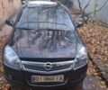 Черный Опель Астра, объемом двигателя 1.4 л и пробегом 173 тыс. км за 5500 $, фото 6 на Automoto.ua