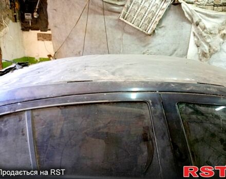 Черный Опель Астра, объемом двигателя 1.6 л и пробегом 245 тыс. км за 1200 $, фото 4 на Automoto.ua