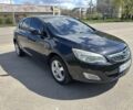 Черный Опель Астра, объемом двигателя 1.2 л и пробегом 256 тыс. км за 4600 $, фото 1 на Automoto.ua