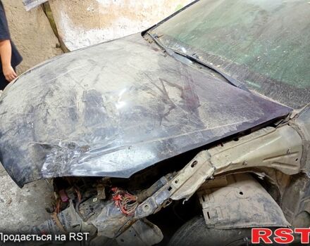 Черный Опель Астра, объемом двигателя 1.6 л и пробегом 245 тыс. км за 1200 $, фото 6 на Automoto.ua