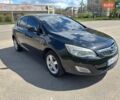 Черный Опель Астра, объемом двигателя 1.25 л и пробегом 256 тыс. км за 4600 $, фото 1 на Automoto.ua