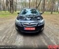 Черный Опель Астра, объемом двигателя 1.6 л и пробегом 195 тыс. км за 7000 $, фото 1 на Automoto.ua