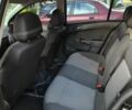 Черный Опель Астра, объемом двигателя 1.6 л и пробегом 253 тыс. км за 5200 $, фото 7 на Automoto.ua