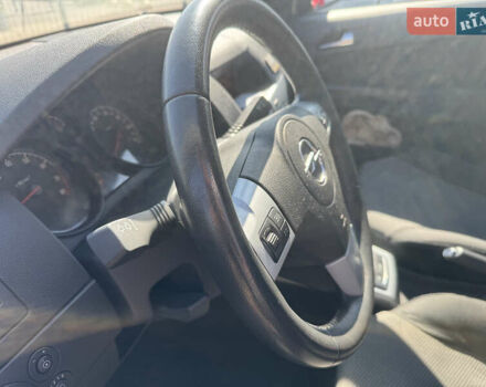 Черный Опель Астра, объемом двигателя 1.6 л и пробегом 130 тыс. км за 6990 $, фото 13 на Automoto.ua