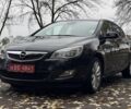 Чорний Опель Астра, об'ємом двигуна 1.4 л та пробігом 124 тис. км за 8607 $, фото 1 на Automoto.ua