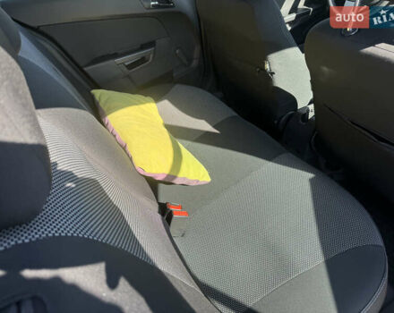 Черный Опель Астра, объемом двигателя 1.6 л и пробегом 130 тыс. км за 6990 $, фото 27 на Automoto.ua