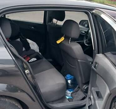 Опель Астра 2012 у Харкові на Automoto.ua Чорний Опель Астра, об'ємом двигуна 1.6 л та пробігом 201 тис. км за 6200 $, фото 11 на Automoto.ua