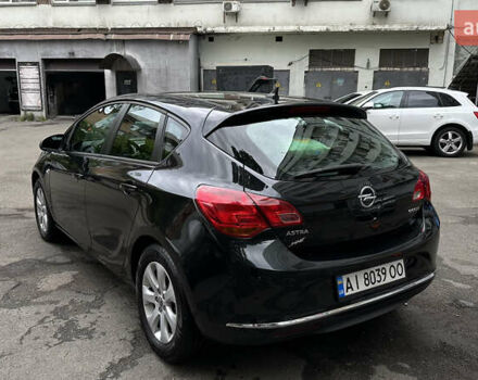 Черный Опель Астра, объемом двигателя 1.2 л и пробегом 235 тыс. км за 6500 $, фото 5 на Automoto.ua