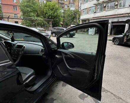Черный Опель Астра, объемом двигателя 1.2 л и пробегом 235 тыс. км за 6500 $, фото 8 на Automoto.ua