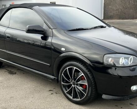 Черный Опель Астра, объемом двигателя 2.2 л и пробегом 200 тыс. км за 4600 $, фото 3 на Automoto.ua