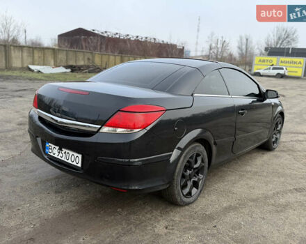 Черный Опель Астра, объемом двигателя 1.8 л и пробегом 224 тыс. км за 3250 $, фото 2 на Automoto.ua