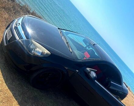 Черный Опель Астра, объемом двигателя 1.8 л и пробегом 230 тыс. км за 4950 $, фото 3 на Automoto.ua