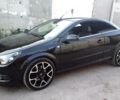 Черный Опель Астра, объемом двигателя 2 л и пробегом 82 тыс. км за 11500 $, фото 1 на Automoto.ua