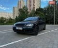 Черный Опель Астра, объемом двигателя 1.6 л и пробегом 290 тыс. км за 3900 $, фото 1 на Automoto.ua