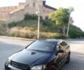 Черный Опель Астра, объемом двигателя 1.8 л и пробегом 320 тыс. км за 3000 $, фото 1 на Automoto.ua