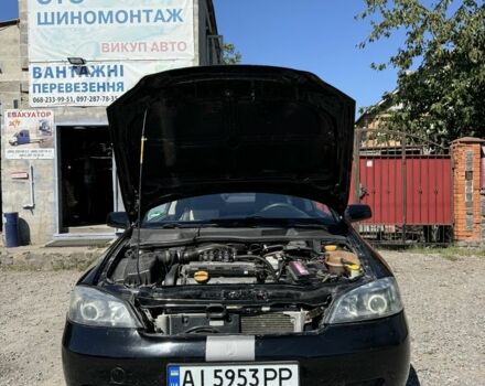 Черный Опель Астра, объемом двигателя 1.8 л и пробегом 286 тыс. км за 3300 $, фото 13 на Automoto.ua