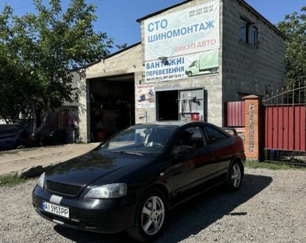 Черный Опель Астра, объемом двигателя 1.8 л и пробегом 286 тыс. км за 3300 $, фото 1 на Automoto.ua